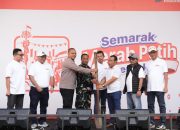 BRI Region 6 Meriahkan Pasar Malaka Rorotan, Dibuka dengan Simbolis Penumbukan Padi