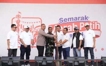 BRI Region 6 Meriahkan Pasar Malaka Rorotan, Dibuka dengan Simbolis Penumbukan Padi